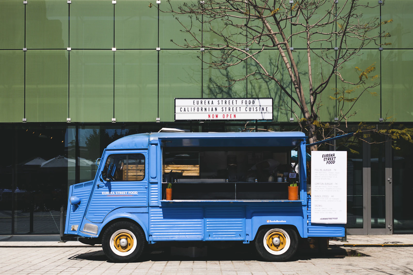 Food truck serving customers at night